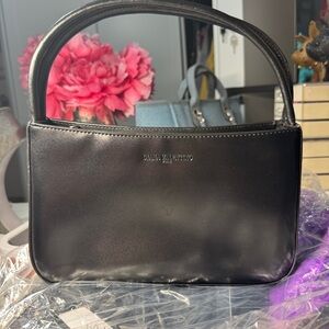 Elegant Black Leather Clutch by Diana Valentino